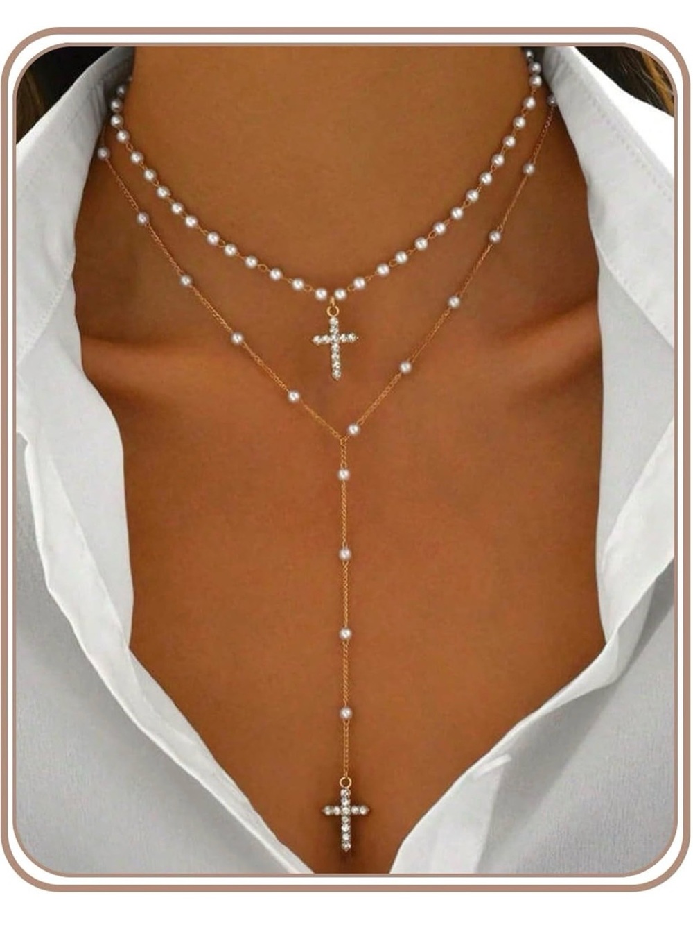 White pearl cross necklace with gold accents